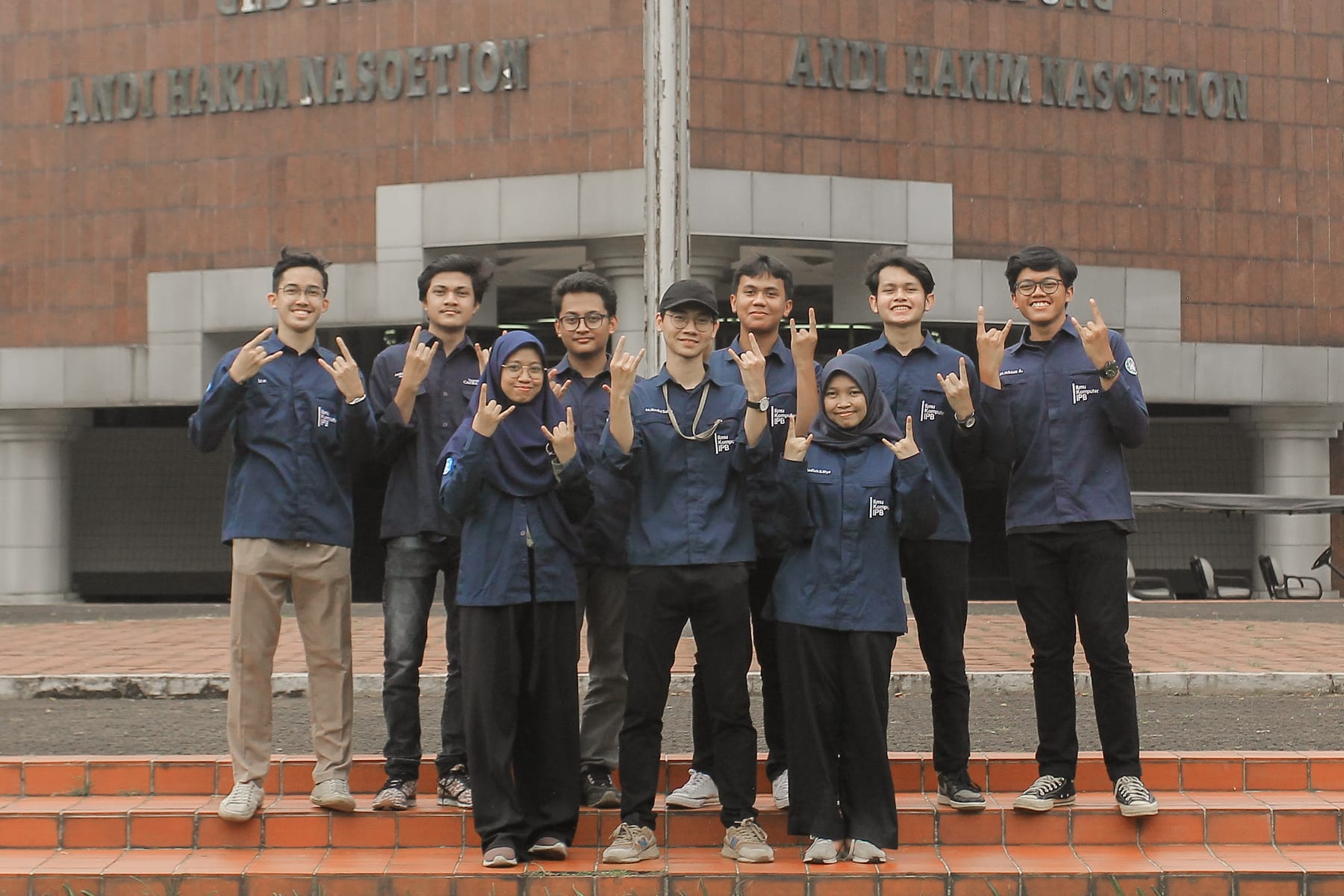 Himalkom Kabinet CONNECT team. Naufal, Head of Media and Branding, is wearing a black cap in the middle.